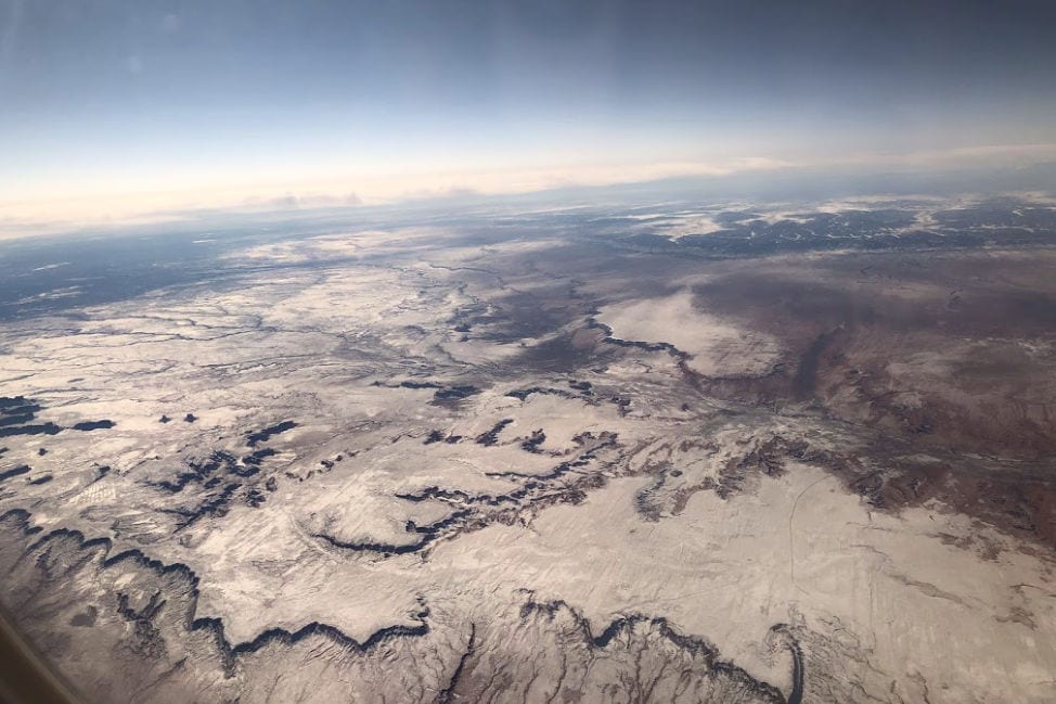 Snow covered mountains aerial view